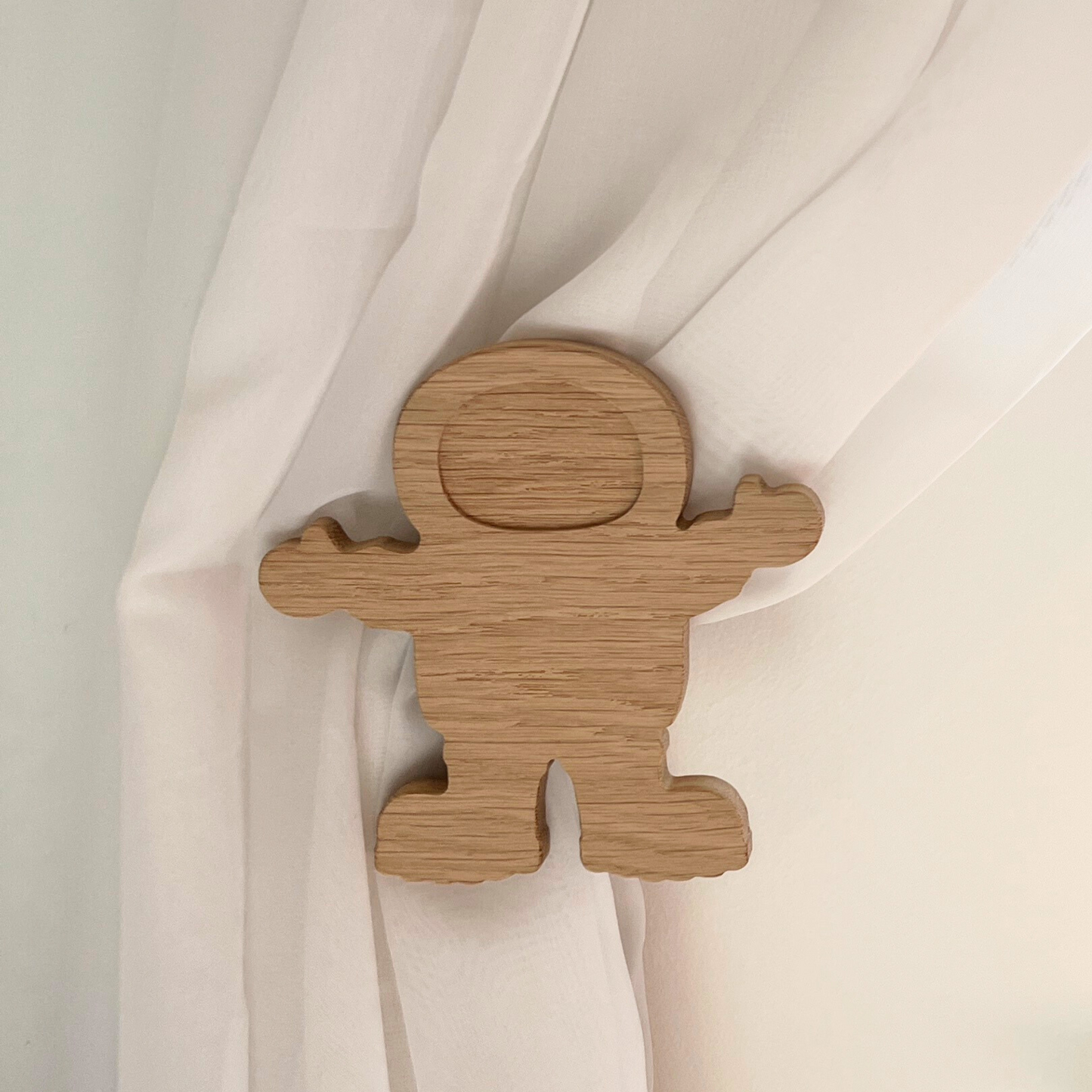 Space curtain tie backs