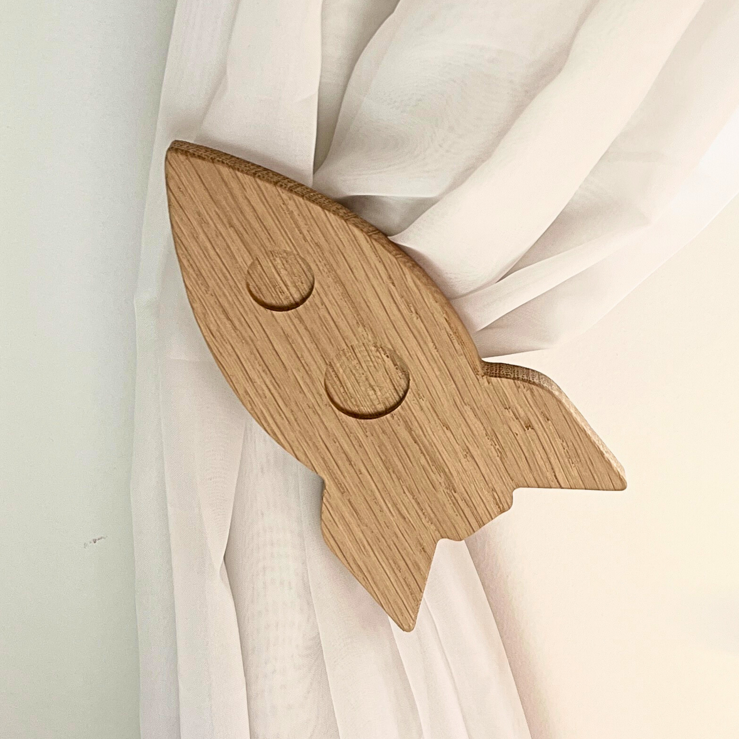 Space curtain tie backs