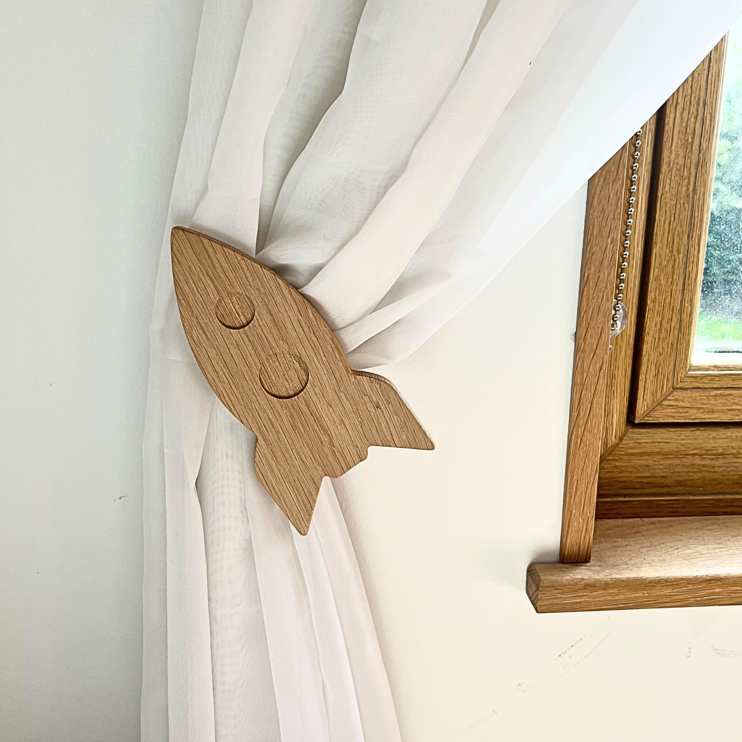 Space curtain tie backs
