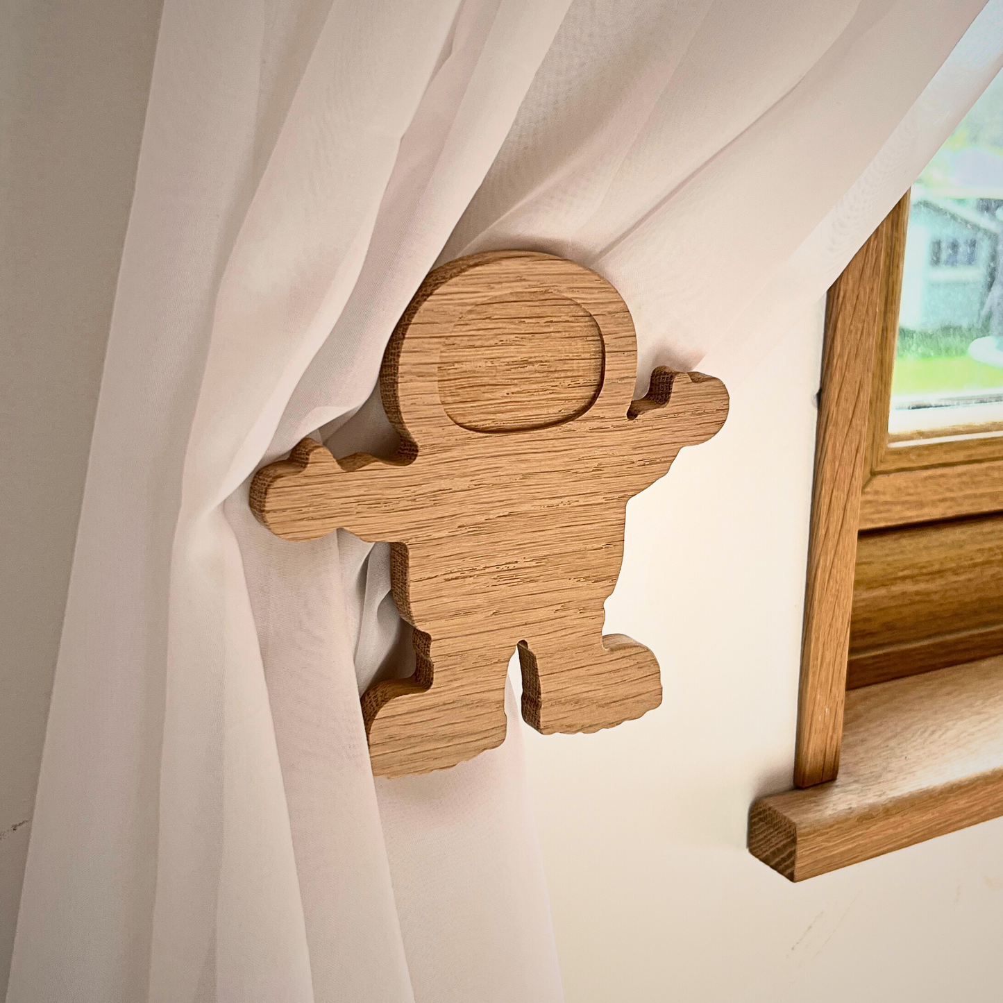 Space curtain tie backs
